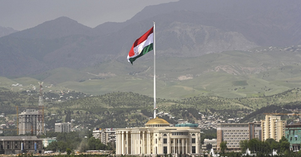 A national flag of Tajikistan is hoisted to the top of the 165-meter (541.34 feet) flagpole in Dushanbe, Tajikistan, Tuesday, May 24, 2011. (AP Photo/Olga Tutubalina)